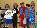 Costumed children participating in 'Camp Curtain Call'