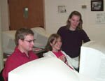 Two hi-ed students using computer software